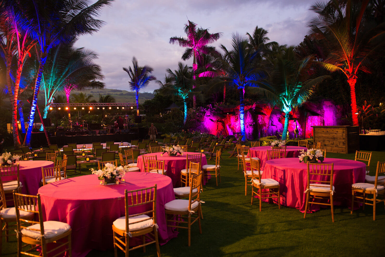 The tropical evening comes alive with brilliant color and lighting.